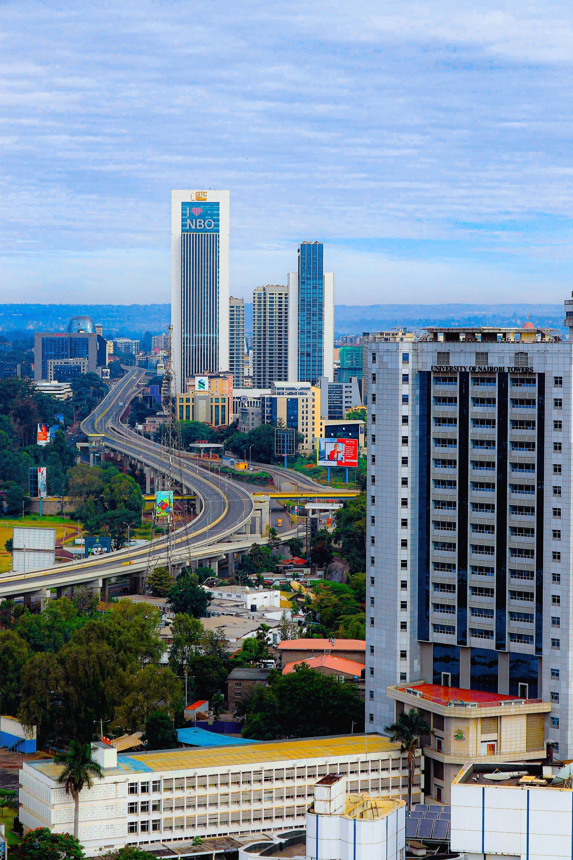 Aerial view of the Nairobi Expressway winding past University of Nairobi Towers